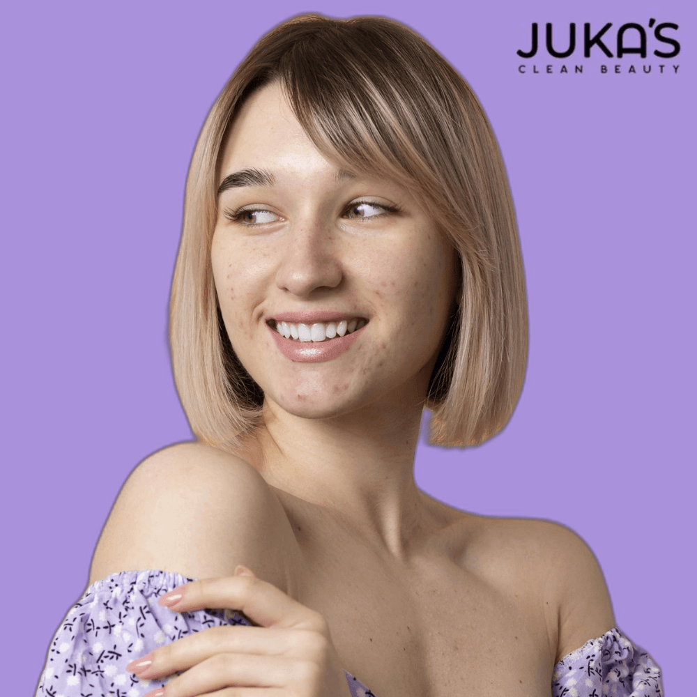 Juka's model showcasing radiant skin, promoting Skin Care Products for Every Skin against a purple background.