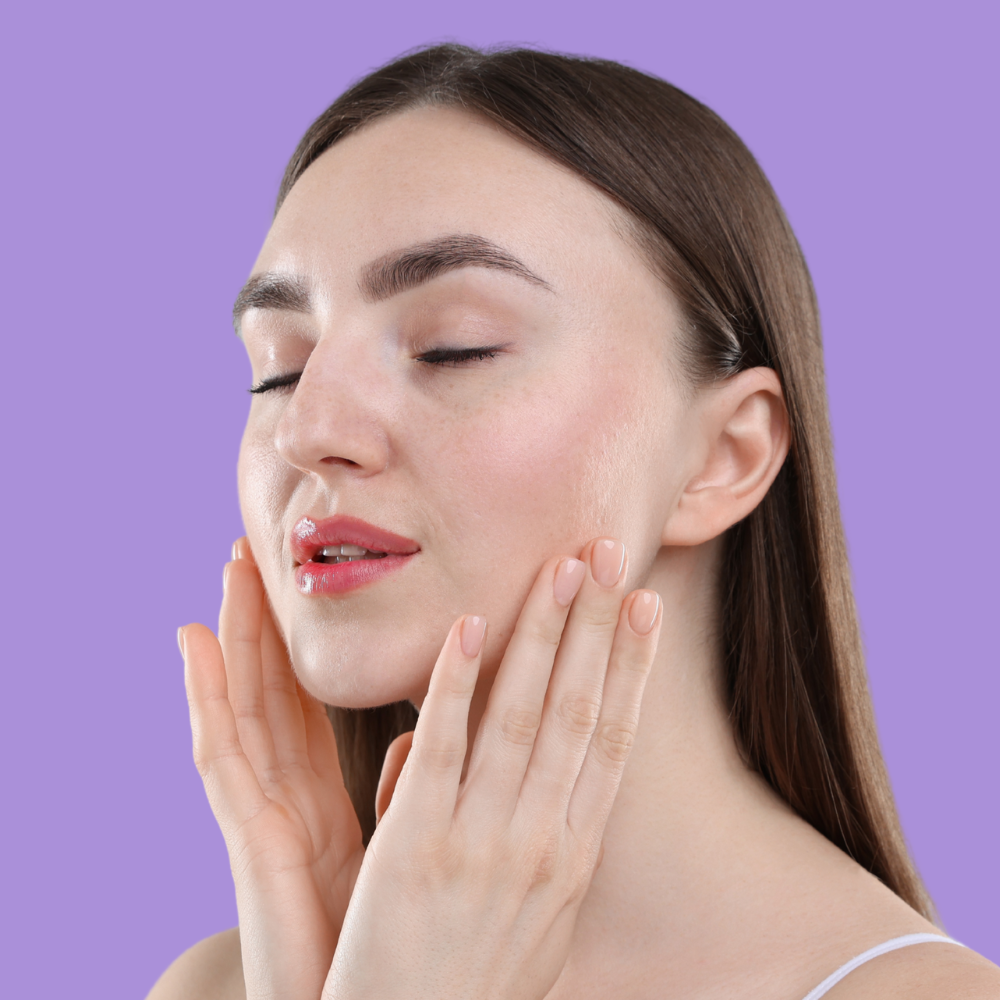 Woman with healthy, natural-looking skin in a clean beauty skincare routine