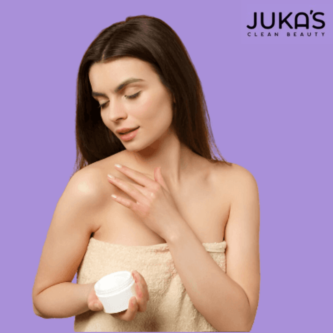 Woman applying body lotion from Juka's Clean Beauty, showcasing body lotion benefits for daily use.