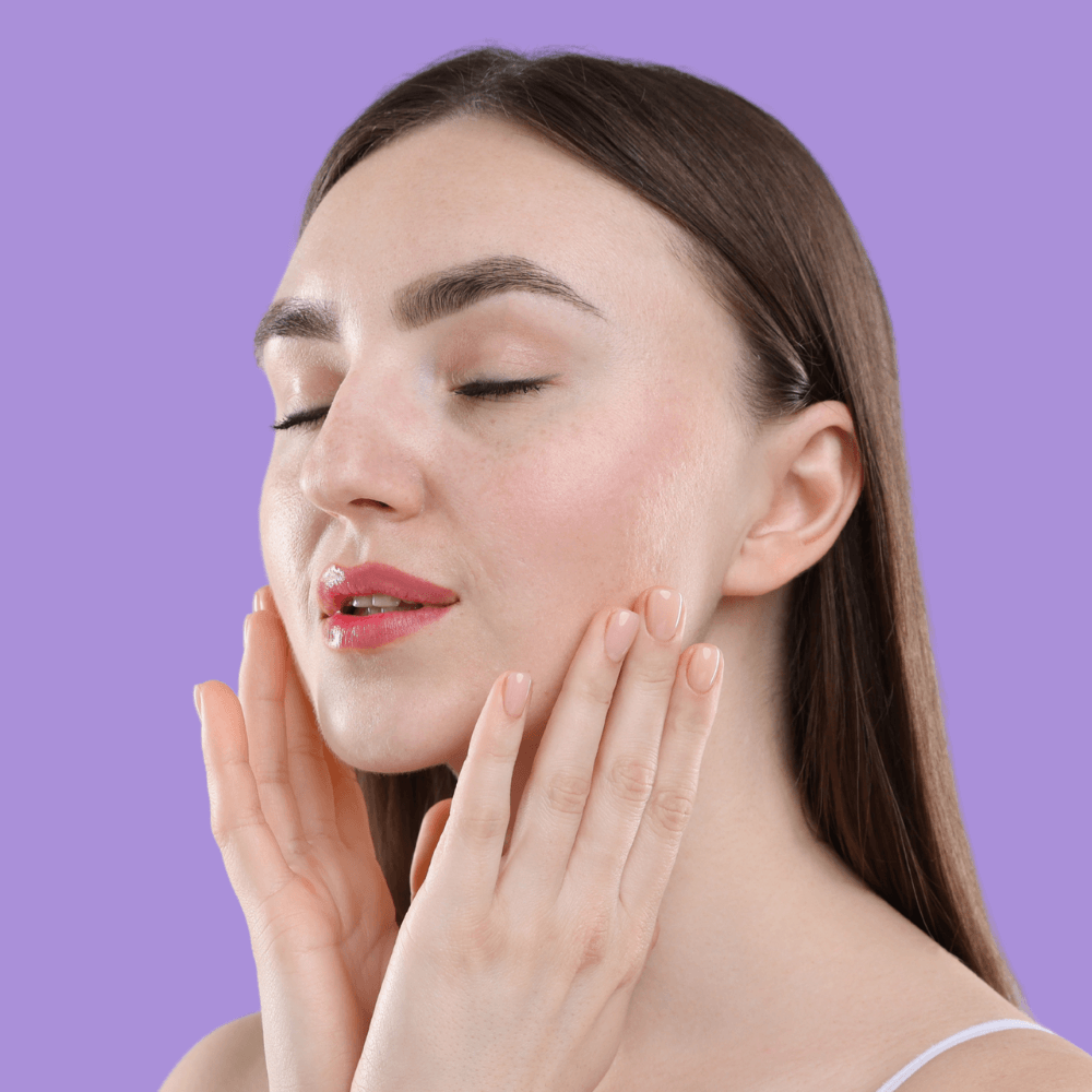 Woman with healthy, natural-looking skin in a clean beauty skincare routine