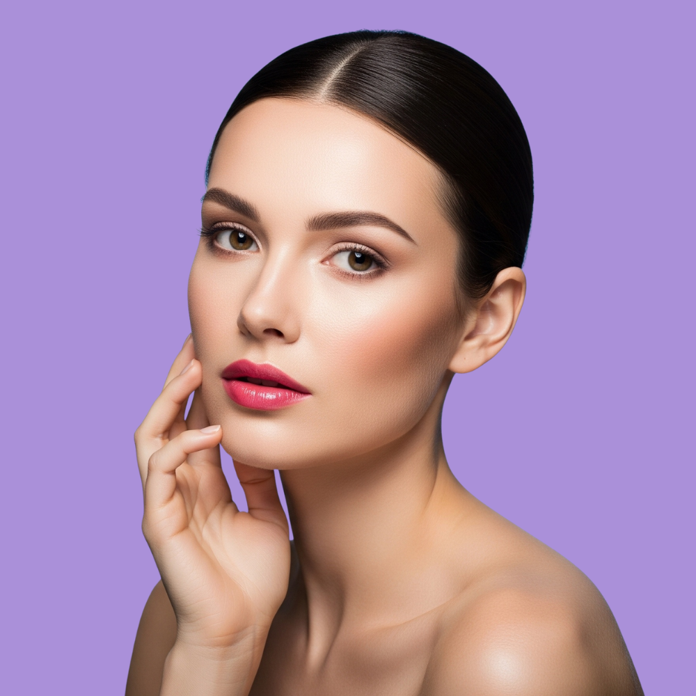 Woman showcasing bright skin, revealing effects of Kojic acid in the Hyper Glow Kit for dark spots.