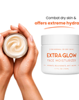 Woman applying JUKA'S Extra Glow Face Moisturizer to her face